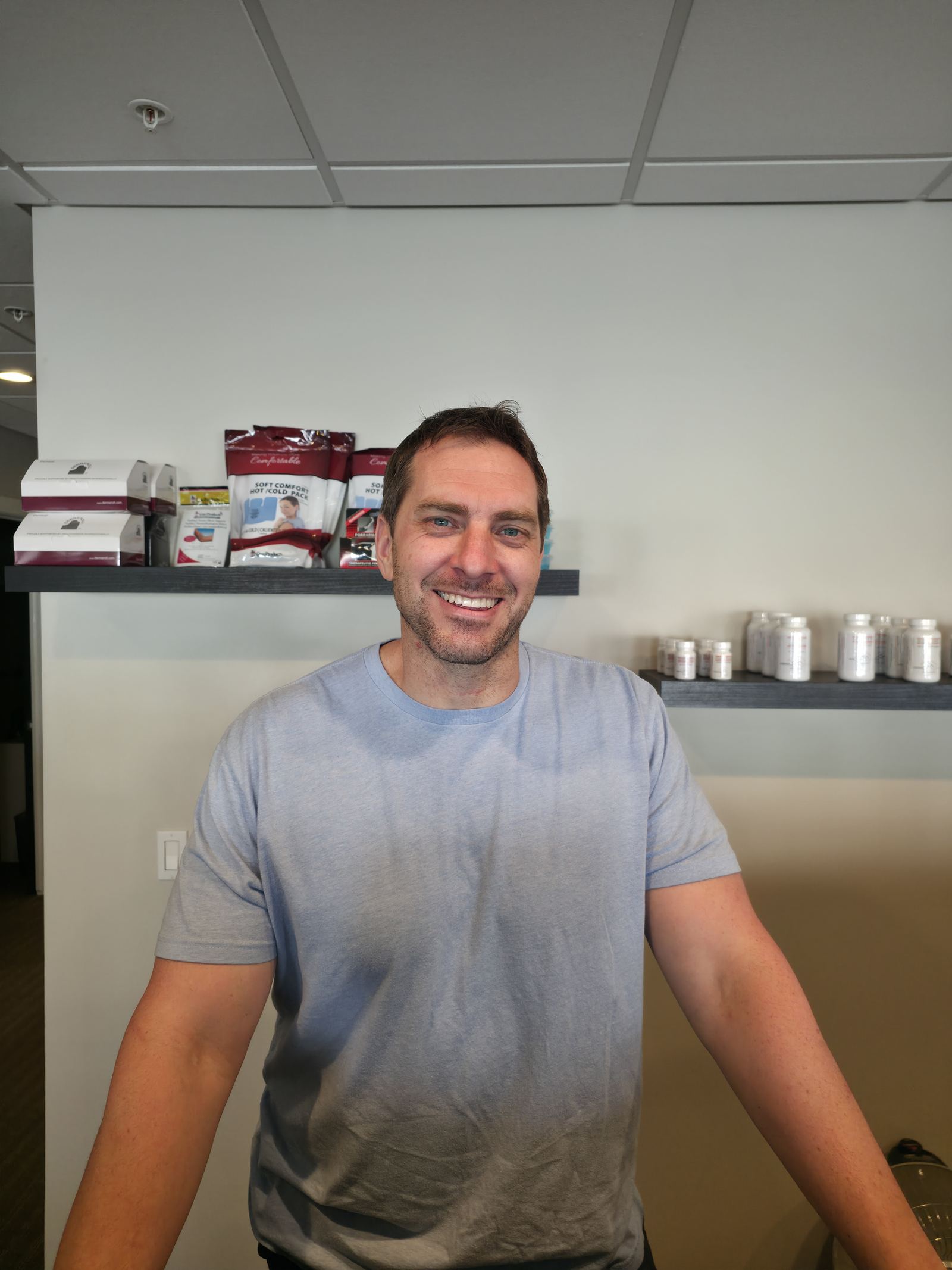 Dr. Cody Mecham meeting with a patient in Murray